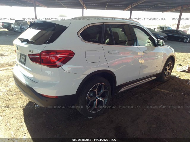 Photo 3 VIN: WBXHU7C35H5H32540 - BMW X1 