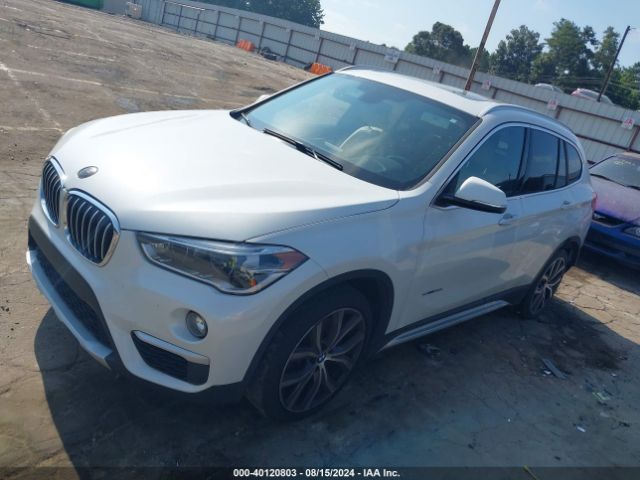 Photo 1 VIN: WBXHU7C35H5H35454 - BMW X1 