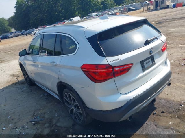 Photo 2 VIN: WBXHU7C35H5H35454 - BMW X1 