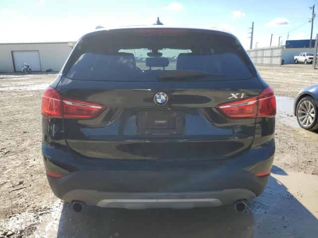 Photo 5 VIN: WBXHU7C35H5H37401 - BMW X1 