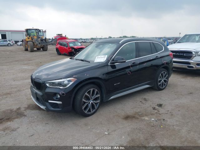 Photo 1 VIN: WBXHU7C35H5H38371 - BMW X1 