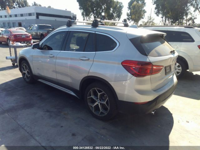 Photo 2 VIN: WBXHU7C35J5H39297 - BMW X1 