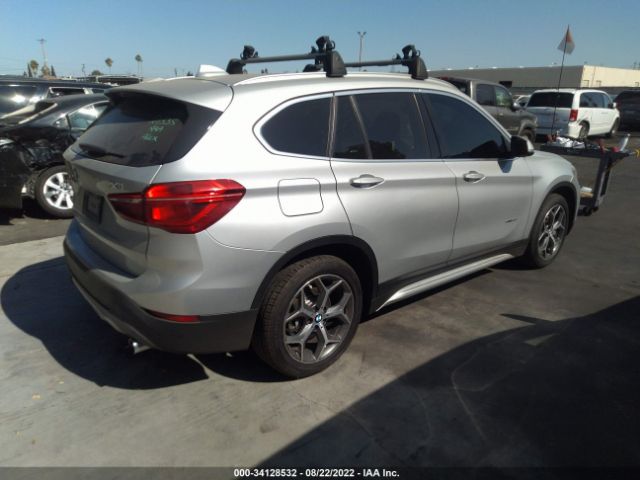 Photo 3 VIN: WBXHU7C35J5H39297 - BMW X1 