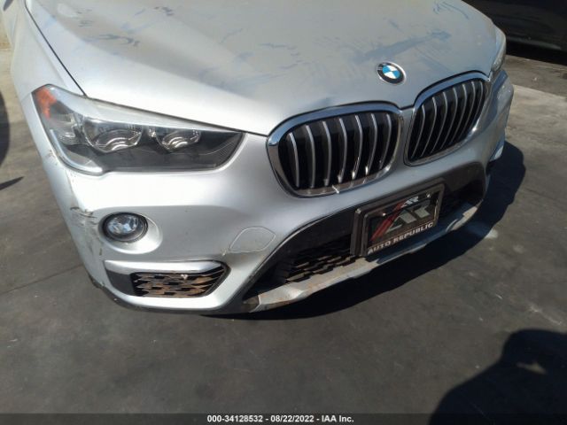 Photo 5 VIN: WBXHU7C35J5H39297 - BMW X1 