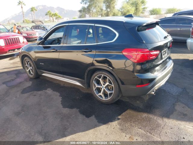 Photo 2 VIN: WBXHU7C35J5H40661 - BMW X1 