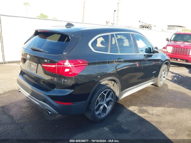 Photo 3 VIN: WBXHU7C35J5H40661 - BMW X1 