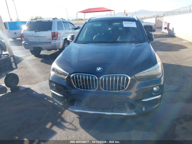 Photo 5 VIN: WBXHU7C35J5H40661 - BMW X1 