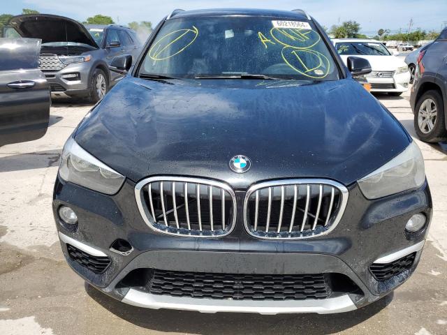 Photo 4 VIN: WBXHU7C35J5H41373 - BMW X1 