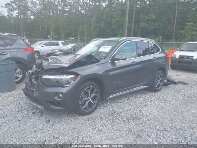 Photo 1 VIN: WBXHU7C35J5H45195 - BMW X1 