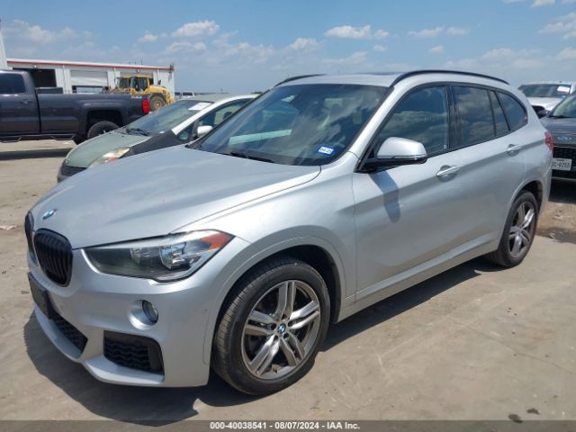 Photo 1 VIN: WBXHU7C35J5L06396 - BMW X1 