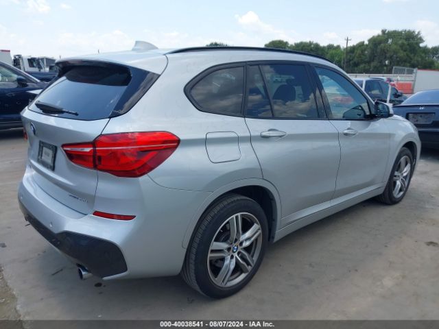 Photo 3 VIN: WBXHU7C35J5L06396 - BMW X1 