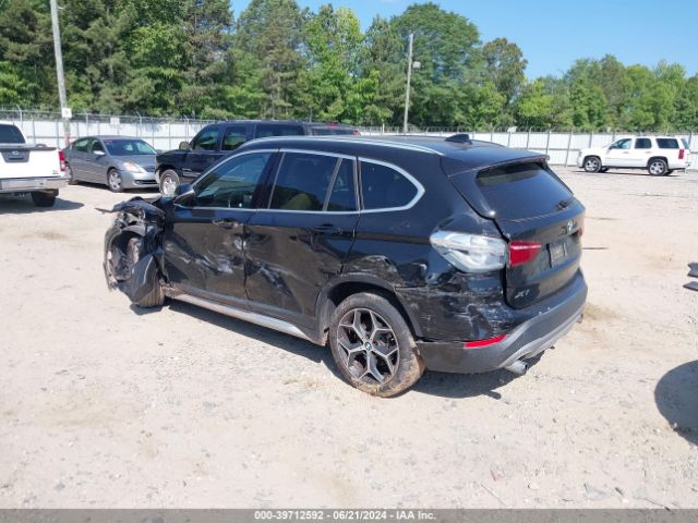 Photo 2 VIN: WBXHU7C35J5L07144 - BMW X1 