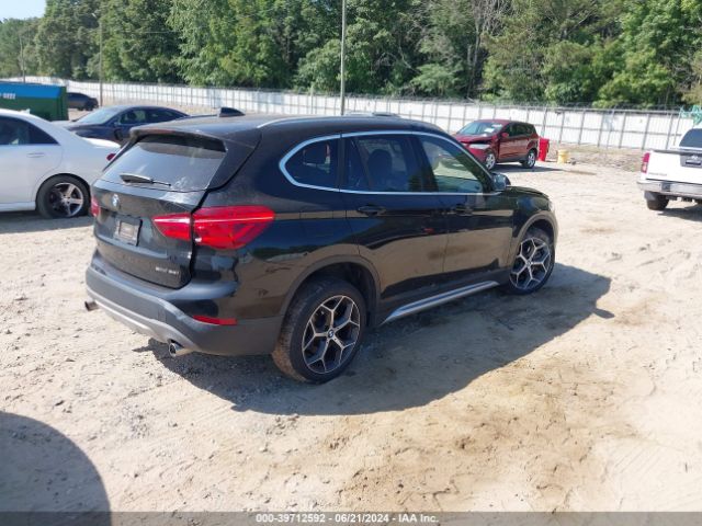 Photo 3 VIN: WBXHU7C35J5L07144 - BMW X1 