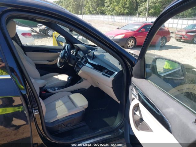 Photo 4 VIN: WBXHU7C35J5L07144 - BMW X1 