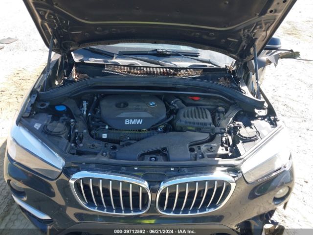 Photo 9 VIN: WBXHU7C35J5L07144 - BMW X1 