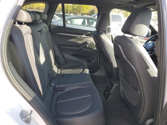 Photo 10 VIN: WBXHU7C35J5L08231 - BMW X1 