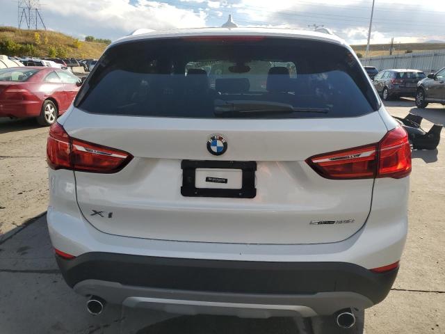 Photo 5 VIN: WBXHU7C35J5L08231 - BMW X1 