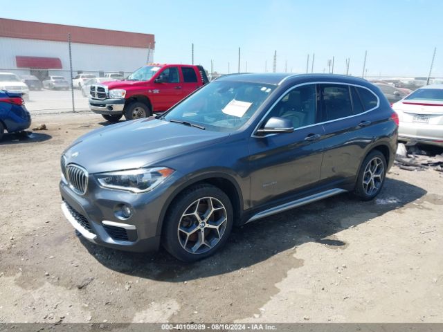 Photo 1 VIN: WBXHU7C36H5H34698 - BMW X1 