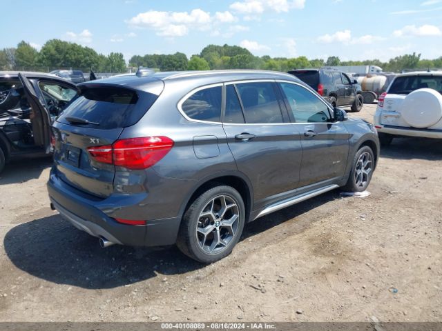 Photo 3 VIN: WBXHU7C36H5H34698 - BMW X1 