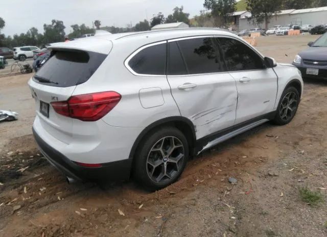 Photo 3 VIN: WBXHU7C36H5H36838 - BMW X1 