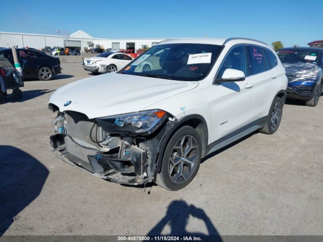 Photo 1 VIN: WBXHU7C36H5H38038 - BMW X1 