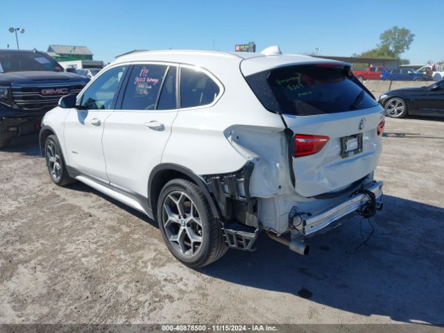 Photo 2 VIN: WBXHU7C36H5H38038 - BMW X1 