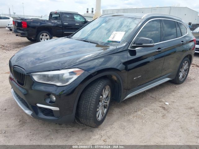 Photo 1 VIN: WBXHU7C36H5H38427 - BMW X1 