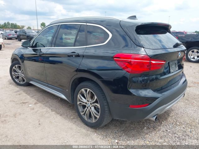 Photo 2 VIN: WBXHU7C36H5H38427 - BMW X1 