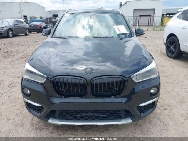 Photo 5 VIN: WBXHU7C36H5H38427 - BMW X1 