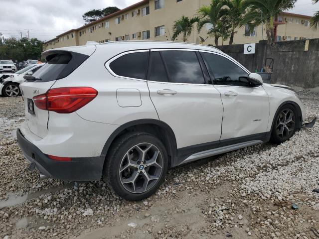 Photo 2 VIN: WBXHU7C36J5H39499 - BMW X1 