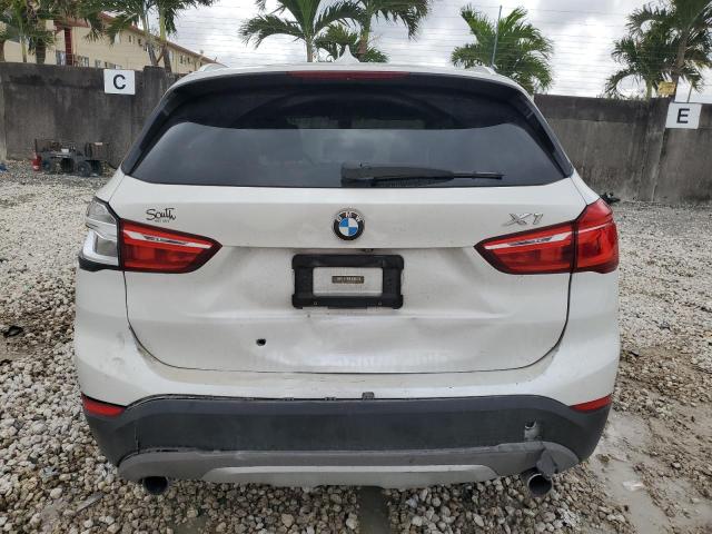 Photo 5 VIN: WBXHU7C36J5H39499 - BMW X1 