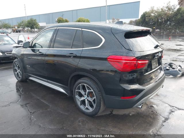 Photo 2 VIN: WBXHU7C36J5H40104 - BMW X1 