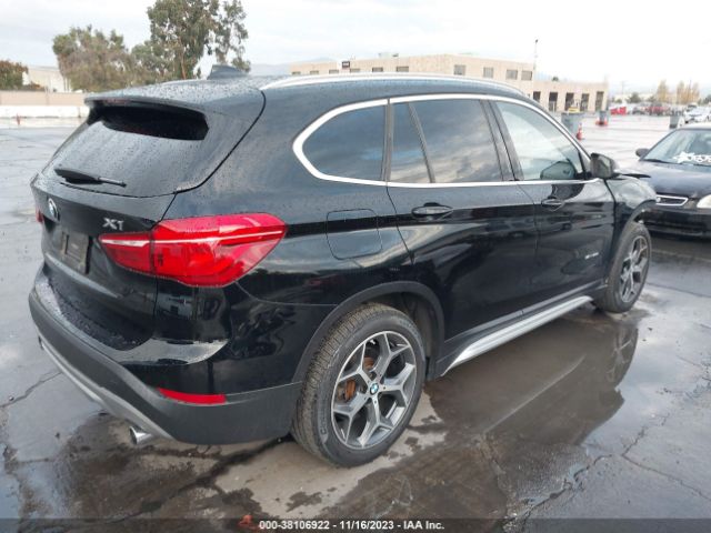 Photo 3 VIN: WBXHU7C36J5H40104 - BMW X1 