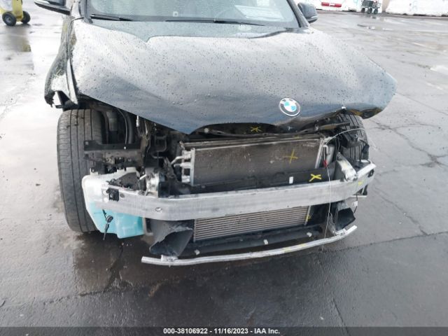 Photo 5 VIN: WBXHU7C36J5H40104 - BMW X1 