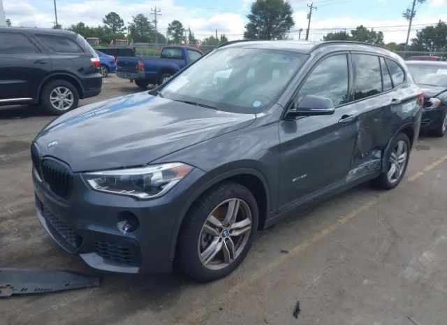 Photo 1 VIN: WBXHU7C36J5H40314 - BMW X1 