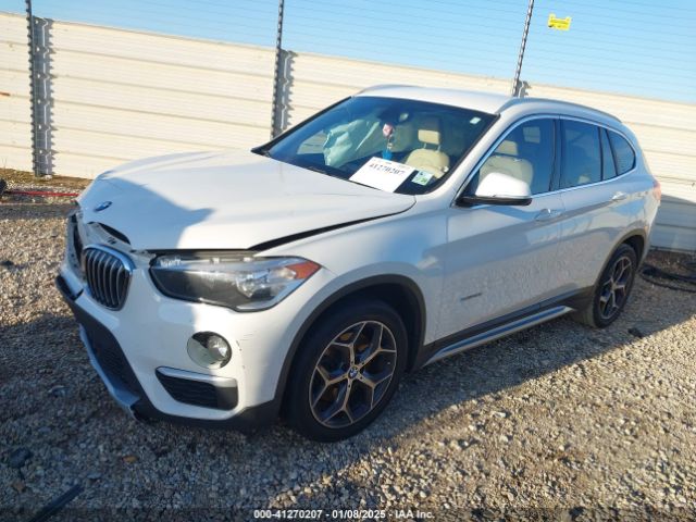 Photo 1 VIN: WBXHU7C36J5H41267 - BMW X1 