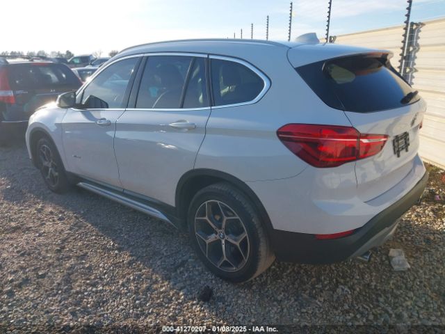 Photo 2 VIN: WBXHU7C36J5H41267 - BMW X1 