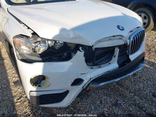 Photo 5 VIN: WBXHU7C36J5H41267 - BMW X1 