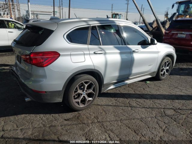 Photo 3 VIN: WBXHU7C36J5H41429 - BMW X1 