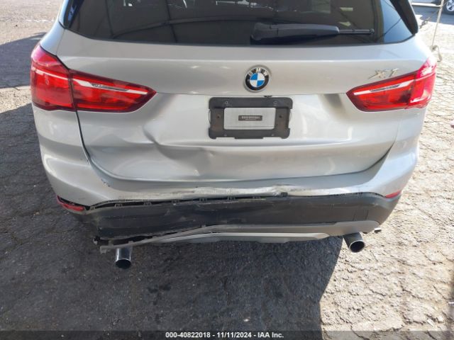 Photo 5 VIN: WBXHU7C36J5H41429 - BMW X1 