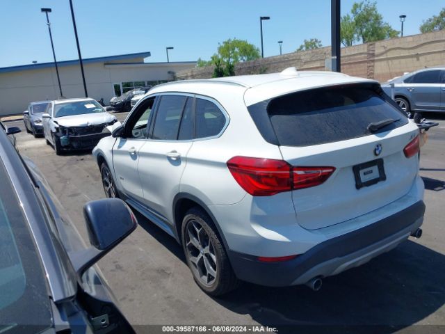 Photo 2 VIN: WBXHU7C36J5H41446 - BMW X1 