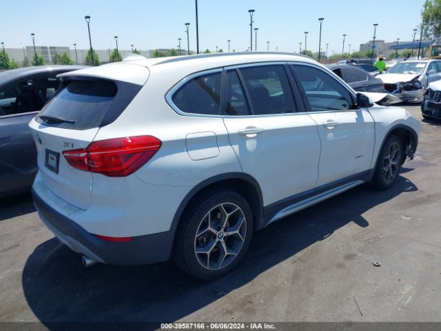 Photo 3 VIN: WBXHU7C36J5H41446 - BMW X1 