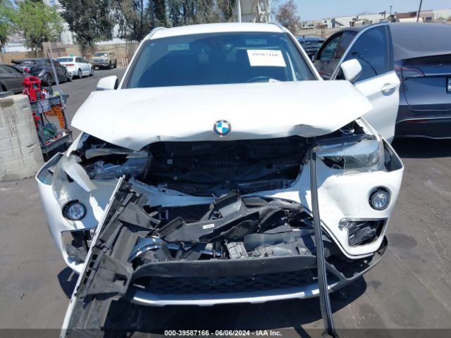 Photo 5 VIN: WBXHU7C36J5H41446 - BMW X1 