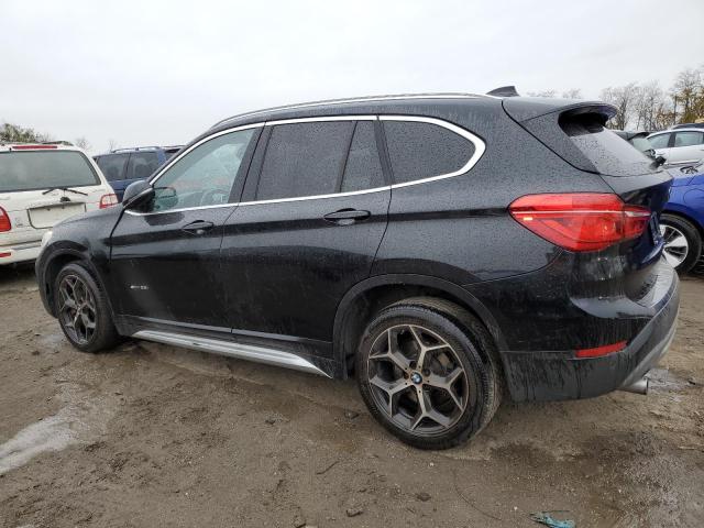 Photo 1 VIN: WBXHU7C36J5H45500 - BMW X1 