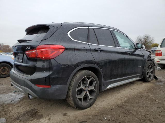 Photo 2 VIN: WBXHU7C36J5H45500 - BMW X1 