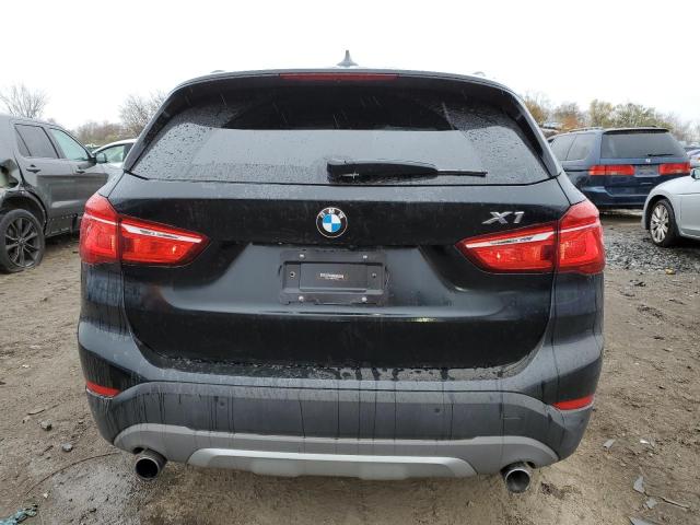 Photo 5 VIN: WBXHU7C36J5H45500 - BMW X1 