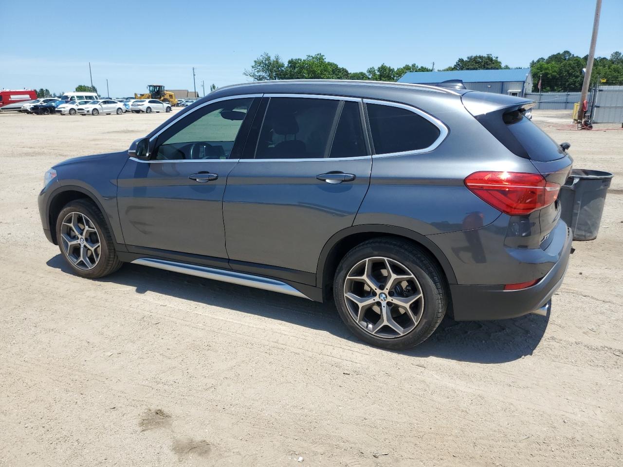 Photo 1 VIN: WBXHU7C36J5L05886 - BMW X1 