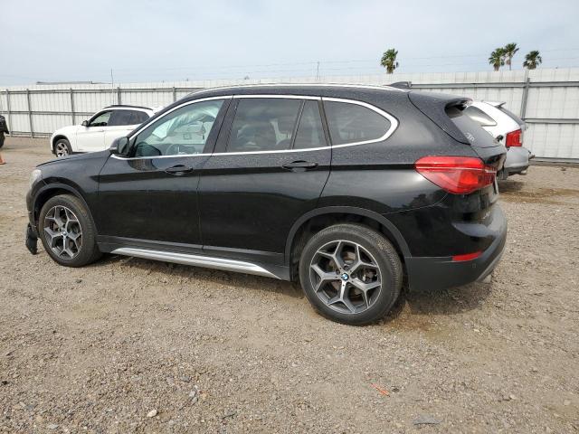 Photo 1 VIN: WBXHU7C36J5L09646 - BMW X1 