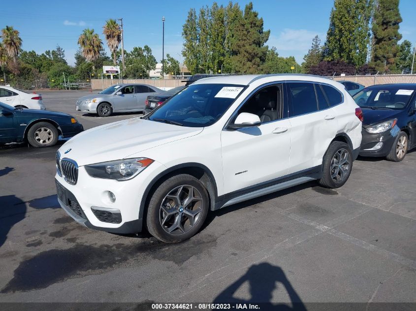 Photo 1 VIN: WBXHU7C37H5H33317 - BMW X1 