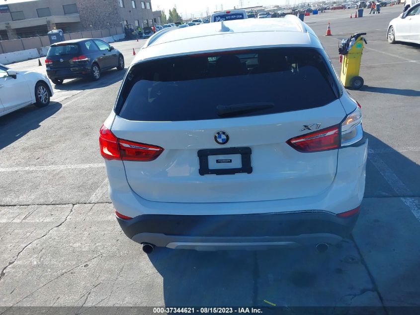 Photo 15 VIN: WBXHU7C37H5H33317 - BMW X1 